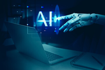 Artificial intelligence. Robot hand touching virtual screen over laptop, toned in blue