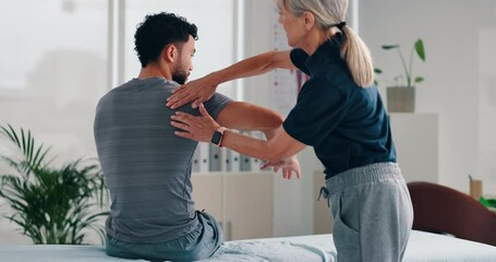 Physiotherapist, patient and shoulder with checkup for consultation, injury or tense muscle at clinic. Chiropractor, client or osteopath helping with sore tension, ache or physiotherapy at practice
