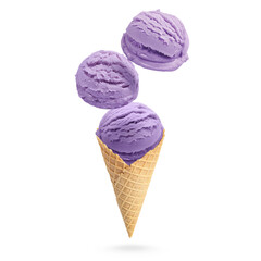 Ice cream scoops and waffle cone in air on white background