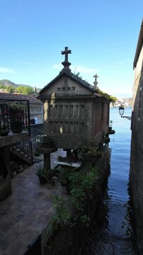 Combarro, horreos and stone crosses overlooking peaceful water in galicia, spain