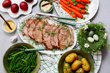 Easter baked pork, carrots, green beans and boiled potatoes.top veiw