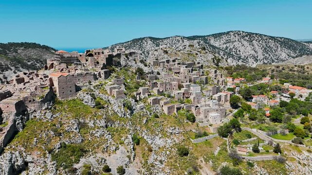 Aerial view of an abandoned ghost town Anavatos with stone buildings on Greek island Chios