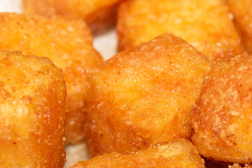 Close up of Square Cooked Crispy Fried Battered Tofu Soy