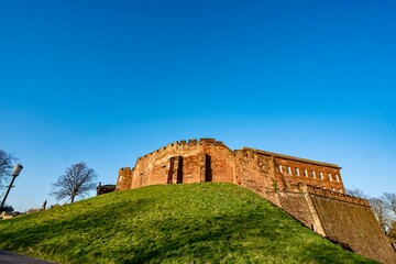 The view of the city of Chester, England as seen from the City Wall that surrounds the interior of...