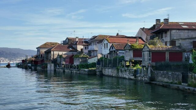 Combarro, horreos and stone crosses overlooking peaceful water in galicia, spain