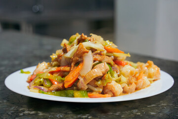 An exquisite dish of vegetables, meat and seafood to delight your senses