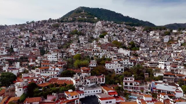 Panoramic view of houses on a hill in the magical town of Taxco de Alarcon in Mexico
