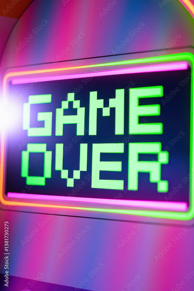 Poster vibrant retro game over screen with neon colors signaling the end of a gaming session