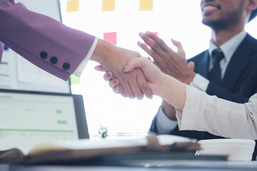 Business Handshake Agreement in Office