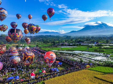 Colorful Hot Air Balloon Festival with a Stunning Mountain View. Ballon festival of Wonosobo, Central Java Indonesia. 