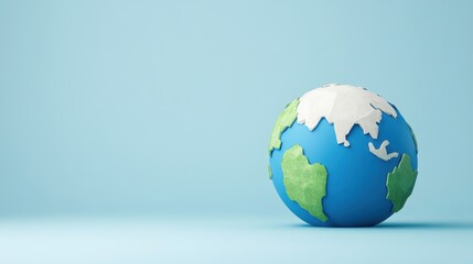 Fototapeta premium Colorful globe with blue ocean and green continents against a light blue background for global themes