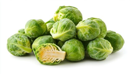 Fototapeta premium Fresh Brussels Sprouts Pile on White Background for Healthy Cooking