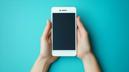 Hands holding blank smartphone, blue background