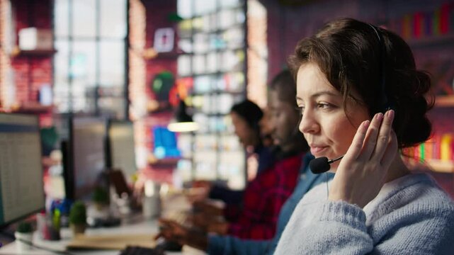 Account manager handling customer inquiries, complaints and support requests in office. Customer service worker assists customers with issues related to products or services, camera B extreme closeup