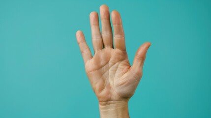 Waving: A friendly gesture involving raising one hand and moving it side to side, often used to say hello, goodbye, or acknowledge someone's presence.