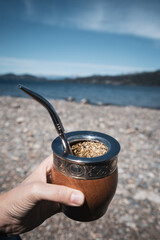 Mate with yerba mate on a beach in Patagonia. A typical hot beverage from Argentina and Uruguay.