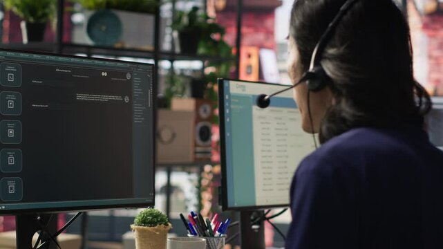 Call center agent using AI chatbot to provide quick and accurate replies to common customer queries. Customer service representative generating automated responses to clients using AI, camera A