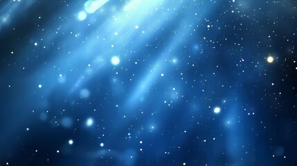 Obraz premium Abstract blue background with bokeh lights, resembles an underwater scene or a night sky full of stars.