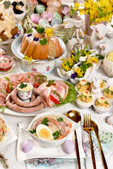 Easter table with traditional dishes and pastries