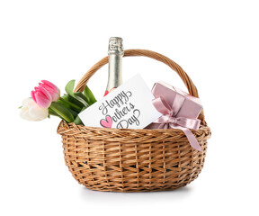 Basket with champagne bottle, tulips and gift box for Mother's Day on white background