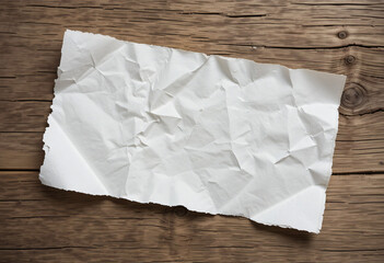 Empty wrinkled white paper texture on weathered oak wood grain table