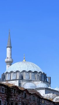 ISTANBUL, TURKEY - AUGUST 8, 2024: Exterior view of the Rustem Pasha Mosque in Eminonu. It was built in 1563 by Mimar Sinan. The mosque of Rustem Pasha, located in Tekirdag. 4K