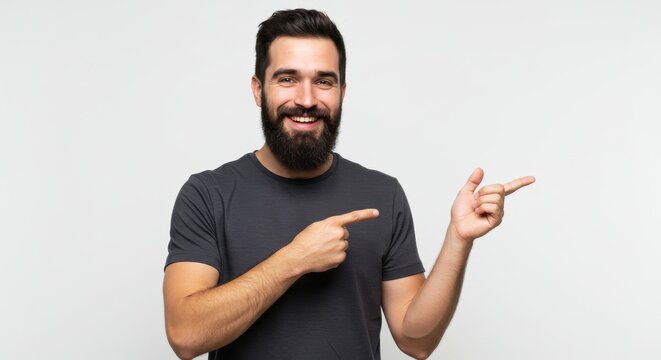 Bearded man smiling confidently dark
