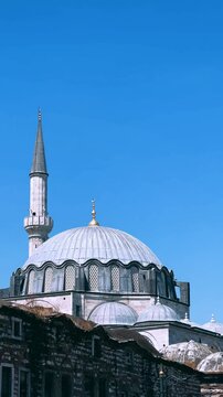 ISTANBUL, TURKEY - AUGUST 8, 2024: Exterior view of the Rustem Pasha Mosque in Eminonu. It was built in 1563 by Mimar Sinan. The mosque of Rustem Pasha, located in Tekirdag. 4K