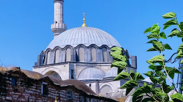ISTANBUL, TURKEY - AUGUST 8, 2024: Exterior view of the Rustem Pasha Mosque in Eminonu. It was built in 1563 by Mimar Sinan. The mosque of Rustem Pasha, located in Tekirdag. 4K