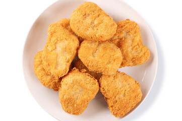 Fried chicken nuggets on white plate isolated on white background. top view

