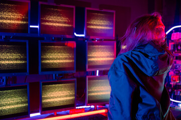Woman hacker failing. Angry Asian woman wearing a black jacket hacking programming system access...