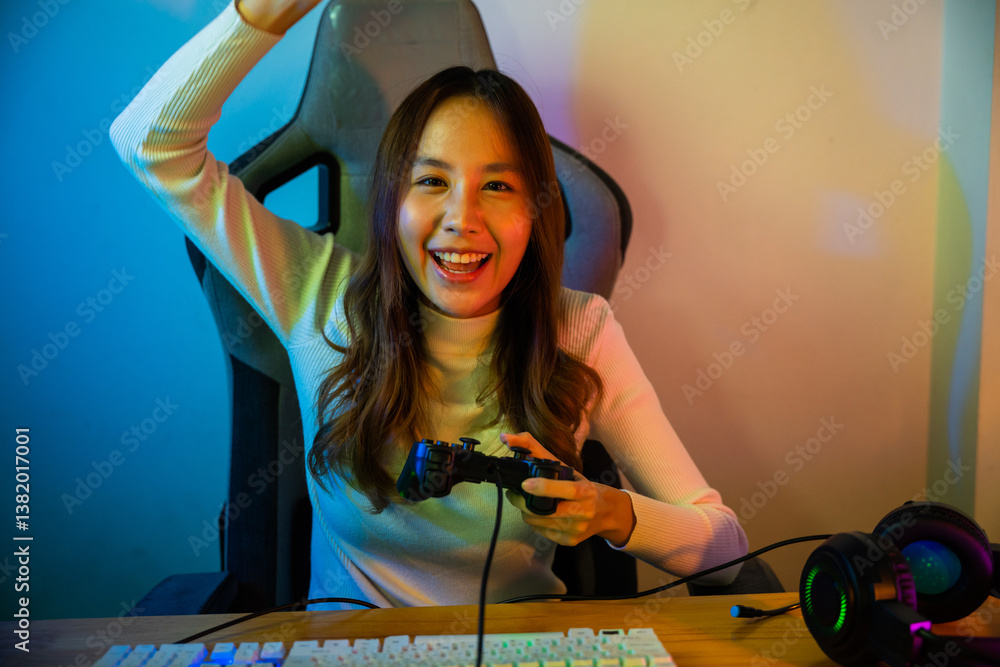 Poster winning. happy gamer using joystick controller for virtual tournament plays online video game with c