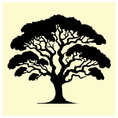 Black silhouette of a tree with many leaves