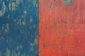 Closeup of Weathered Blue and Red Painted Wooden Surface