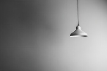 Minimalist Hanging Lamp Against Textured Gray Background