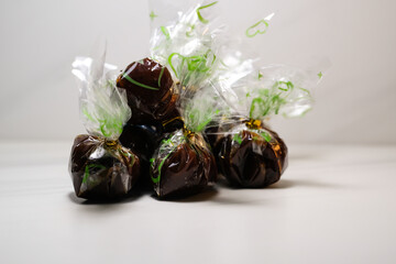 Studio shot of sweet food typical of East Java Indonesia. Food in the form of sugar candy that is cooked for a long time until it thickens and becomes chewy. Tasty and sweet gourmet. Indonesia Cuisine