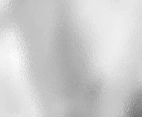 Close-up view of a frosted or brushed metallic surface with a subtle texture and light reflection. Ideal for use in design backgrounds, packaging, or industrial-themed mockups.