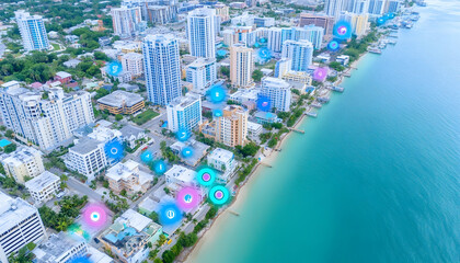 Aerial view of coastal city with digital overlays showing locations