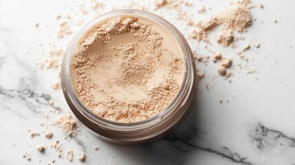 Close-up of a luxurious loose powder jar, slightly tilted with finely milled beige powder scattered gently on a white marble slab