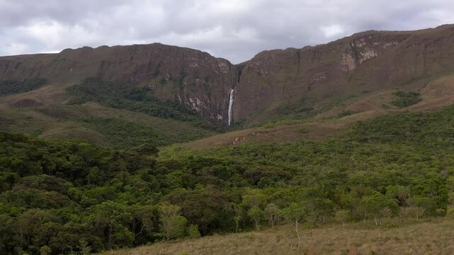 Serra da canastra with a waterfall and green landscape in minas gerais, aerial view