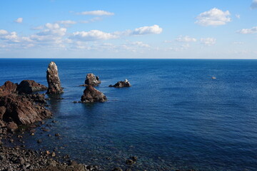 rock islands and clear blue sea