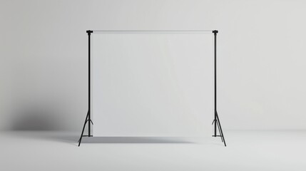 Minimalist white backdrop stand in studio setting with soft shadows