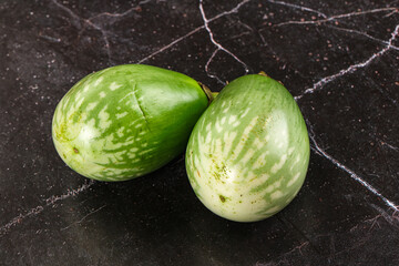Ripe green mini eggplants heap