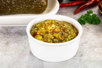 Souce gherkin relish with marinated cucumbers