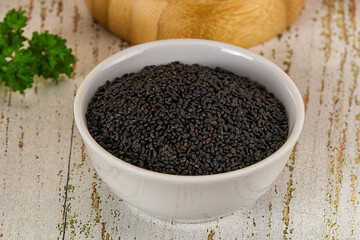 Black dry Nigella seeds in the bowl