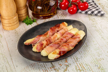 Hot mozzarella sticks with bacon