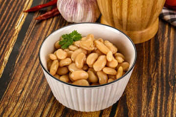 Baked white canned beans in the bowl