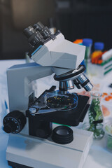Team Asian scientists in a lab conducting food research using a microscope and lab equipment, showcasing innovation in food science and biotechnology