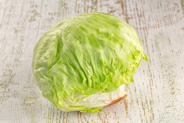 Raw iceberg salat over background