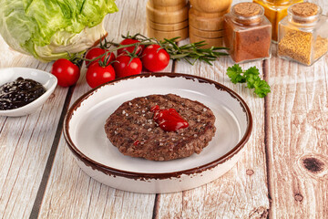 Grilled juicy beef cutlet for burger